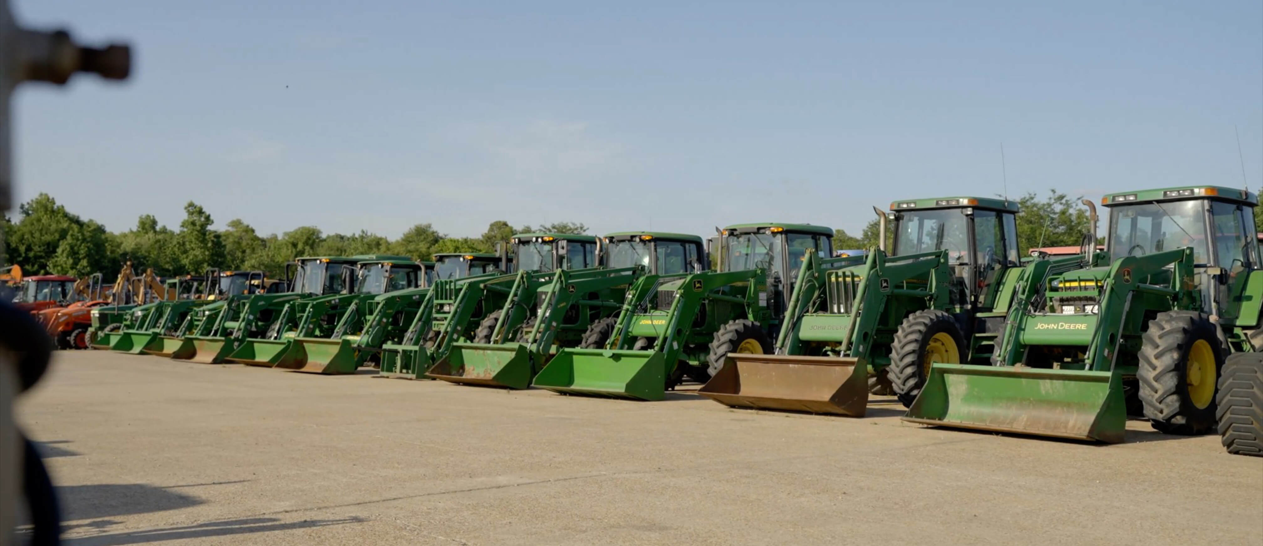 Row of John Deer tractors