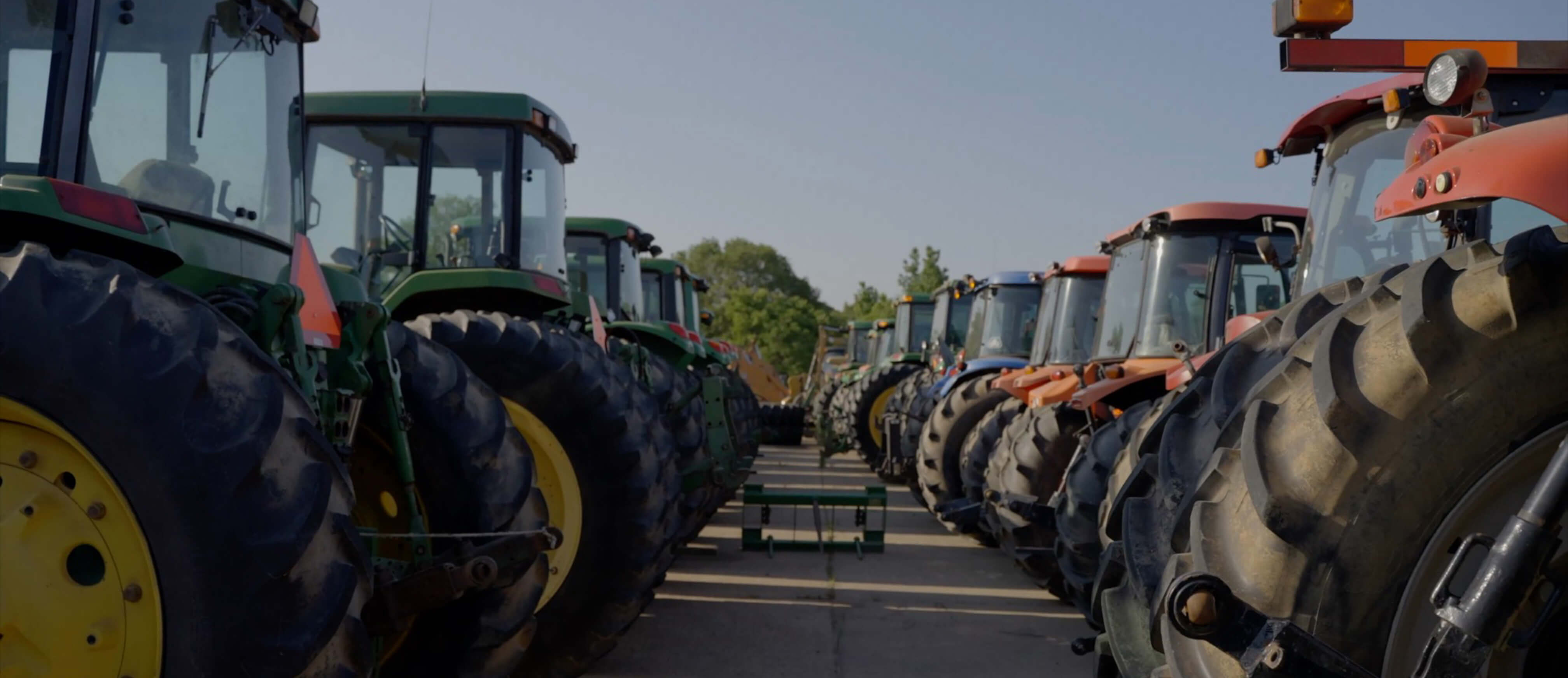 Row of John Deer tractors